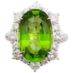 Peridot Oval and White Diamond Round Cocktail Ring in Platinum