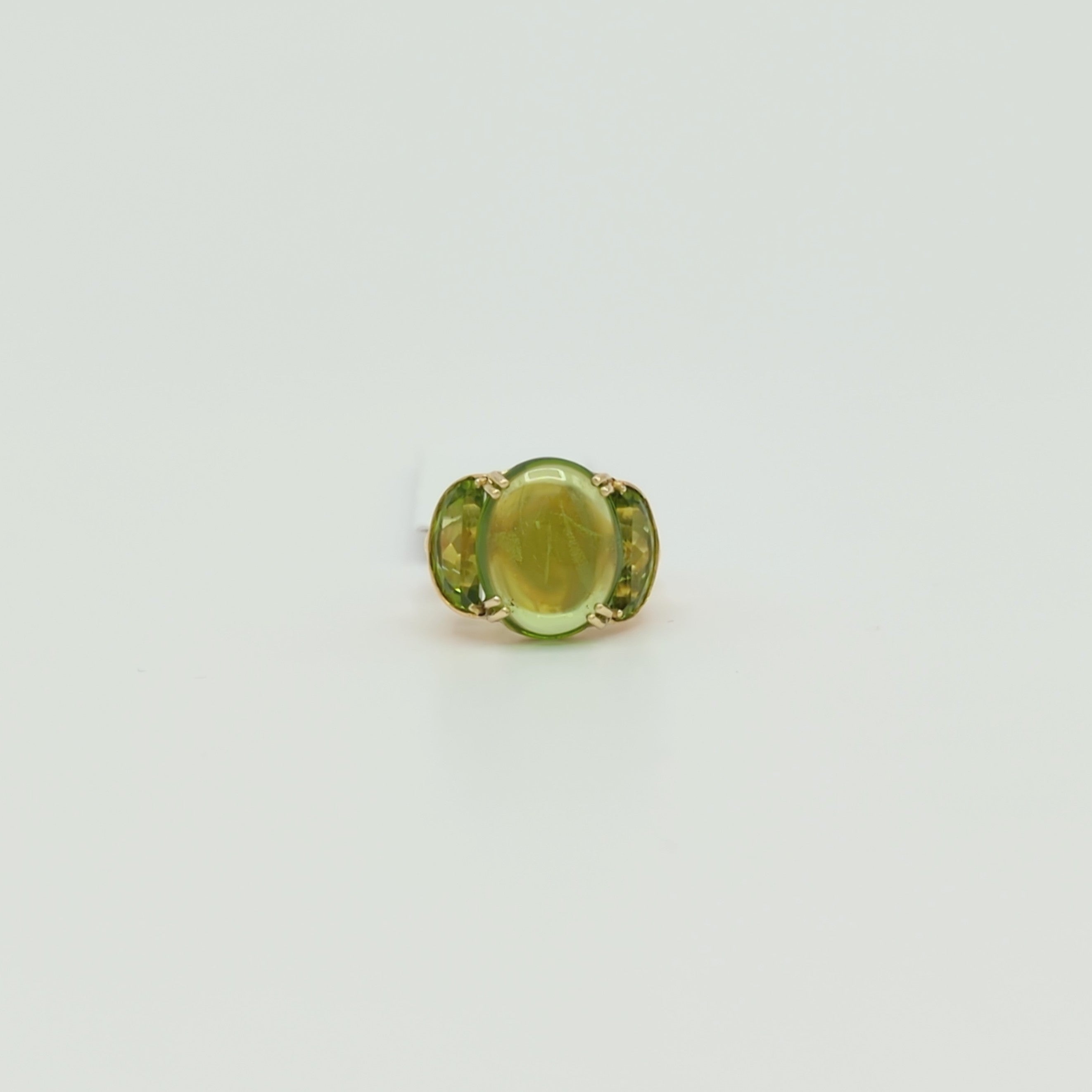 Women's or Men's Peridot Oval Cabochon Three Stone Ring in 18K Yellow Gold For Sale