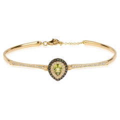 Peridot-Armband im Birnenschliff aus 18 Karat Gold mit blauen und weißen Pavé-Diamanten