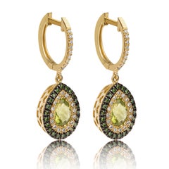 Peridot Pear Shape Earrings 18Kt Yellow Gold with Blue and White Pave Diamonds