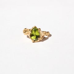 Peridot Pear Solitaire Ring in 14 Karat Yellow Gold