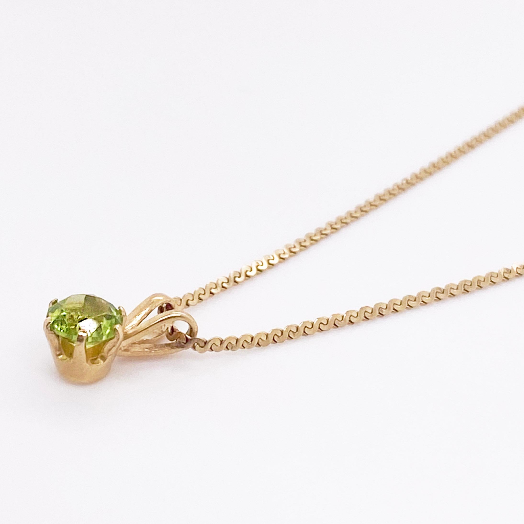 The round peridot is modest at 1/2 carat in a six prong setting set in solid 14 karat yellow gold. The chain is the coveted serpentine (S design) that is nice and strong at 1.2 millimeters wide. This chain will be attractive by itself or with any
