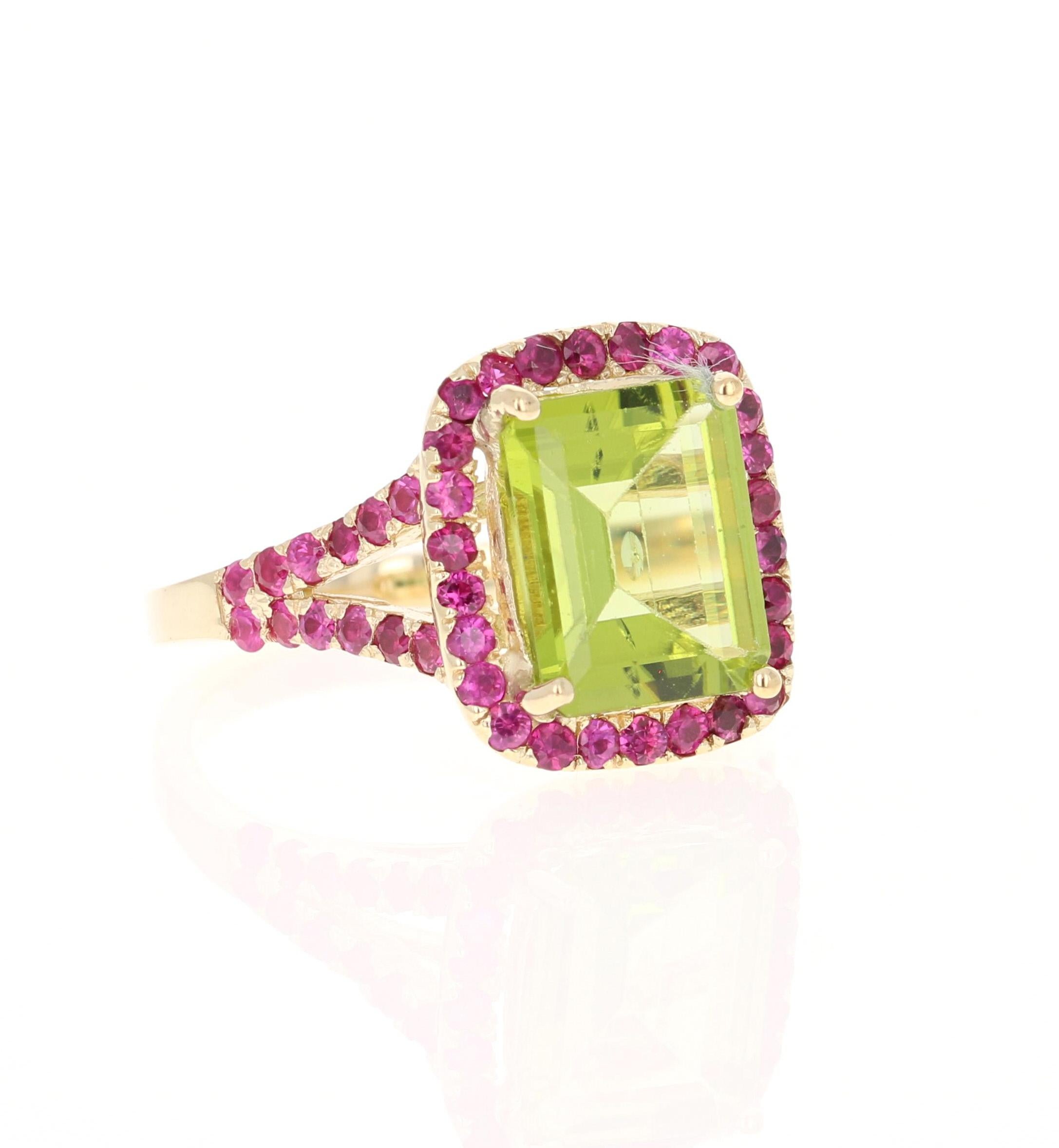 This ring has a 2.83 carat Peridot and 52 Pink Sapphires that weigh 1.10 Carats. The total carat weight of the ring is 3.93 Carats. 
Curated in 14 Karat Yellow Gold and weighs approximately 4.2 grams. 

The ring size is 7 and can be re-sized if