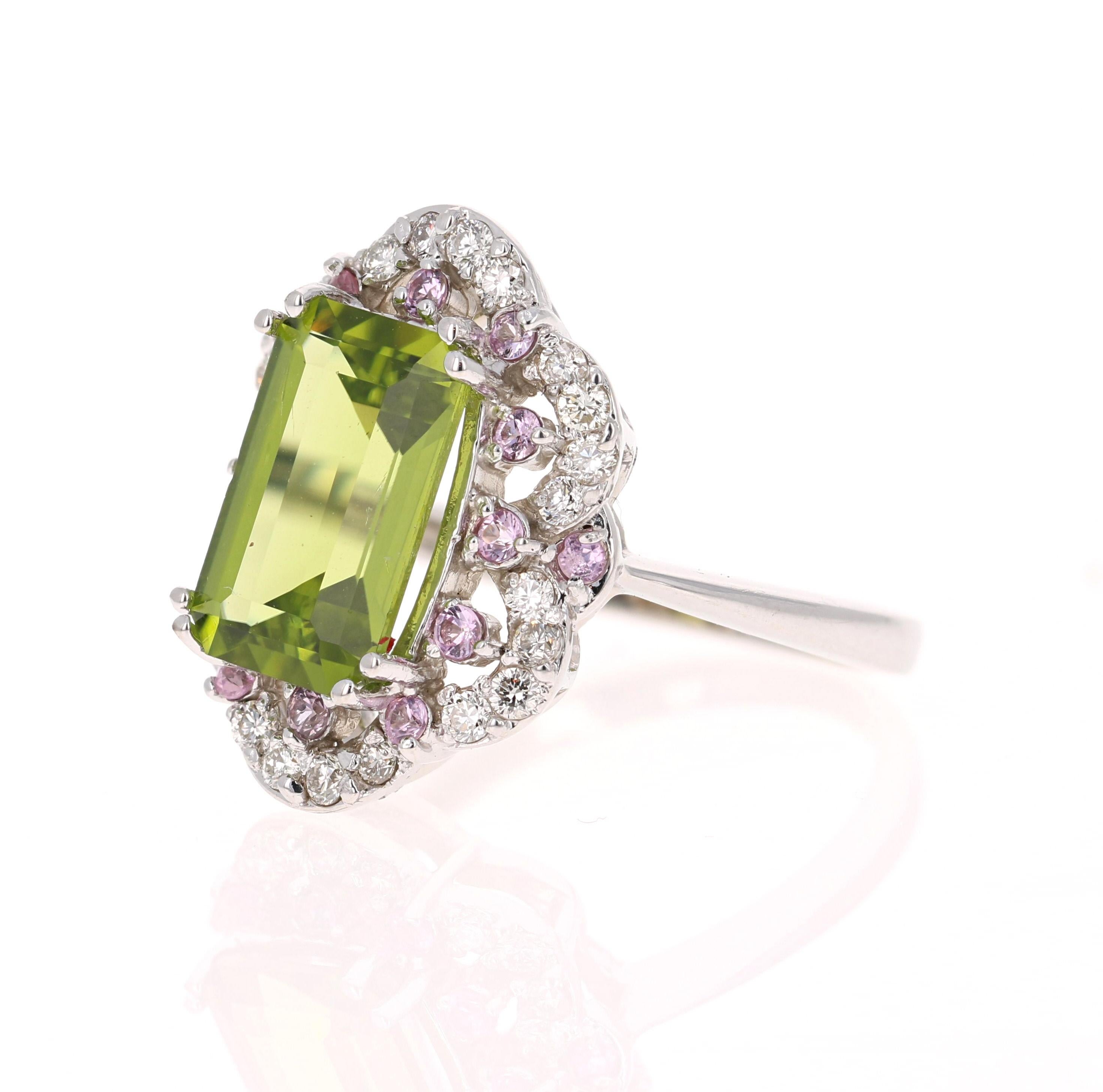 Contemporary 4.86 Carats Peridot Pink Sapphire Diamond 14 Karat Yellow Gold Cocktail Ring For Sale