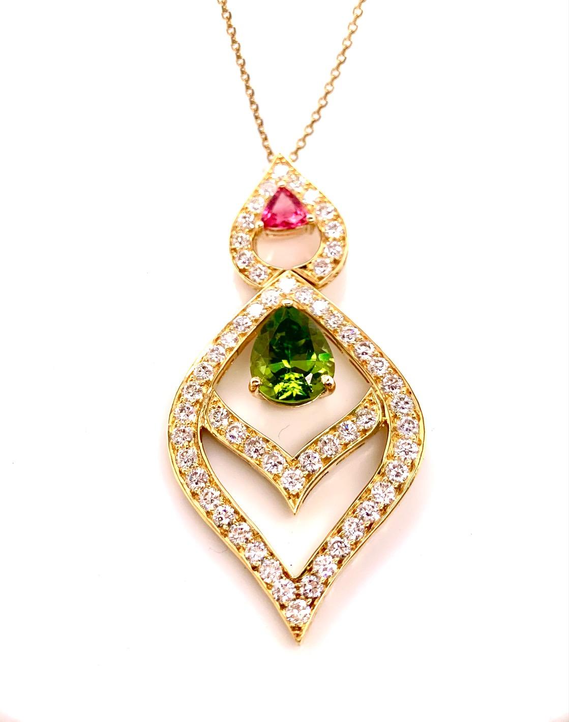 Geometric Lantern Style Period and Pink Tourmaline Necklace

Pear Shape Peridot - 4.50 carat
Triangular Pink Tourmaline - 0.75 carat
Side Diamond Color -F/G
Clarity - VS 
Side Diamonds -3.45 carat 
Side Diamond Shape - Round 
Weight - 17 grams