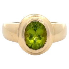 Anello con peridoto in oro giallo 14K