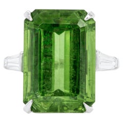 Peridot Ring 22 Carats With Two Tapered Baguette Diamonds Platinum