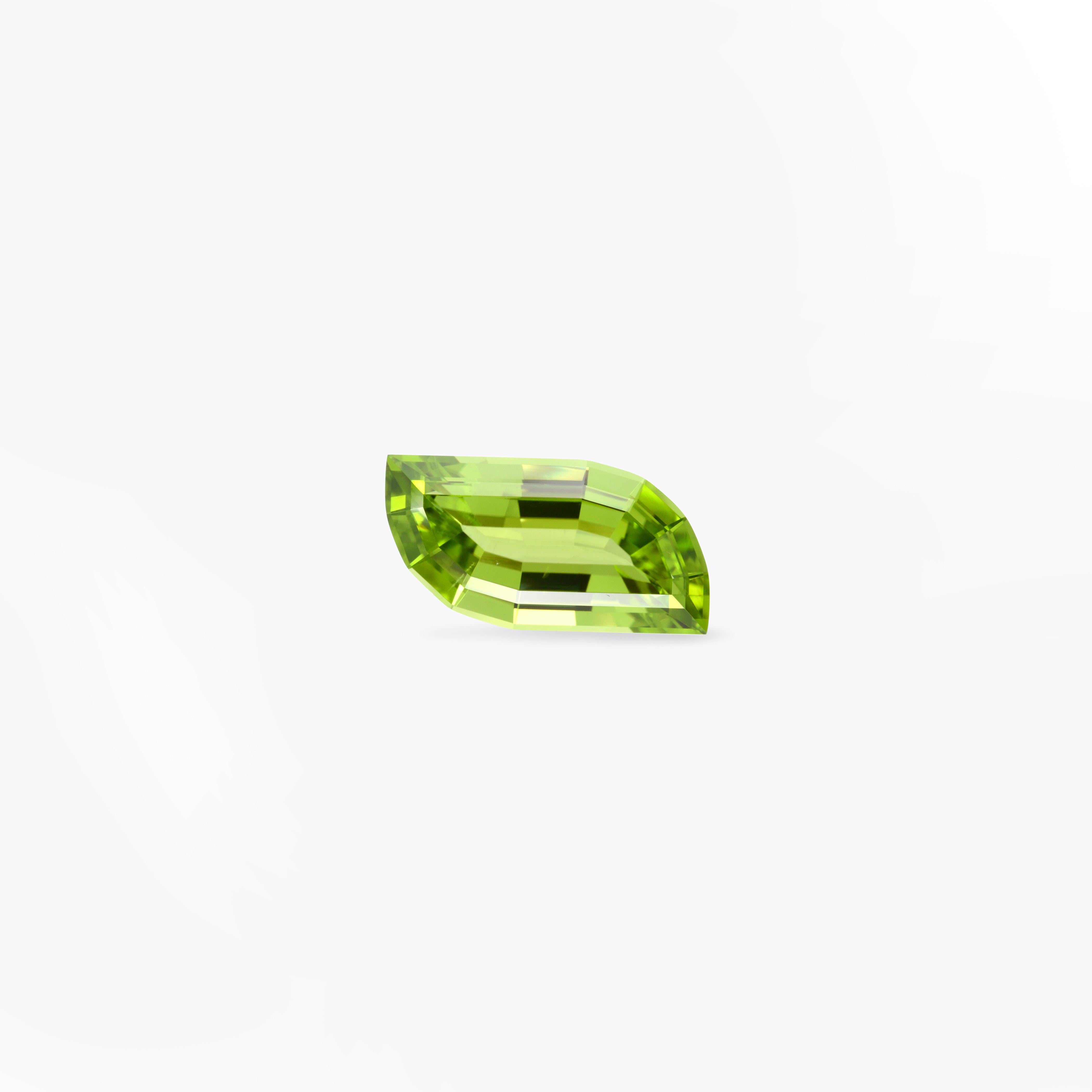 Exclusive 7.25 carat unmounted Peridot leaf-shaped gem, offered loose to a fine gemstone collector.
Returns are accepted and paid by us within 7 days of delivery.
We offer supreme custom jewelry work upon request. Please contact us for more