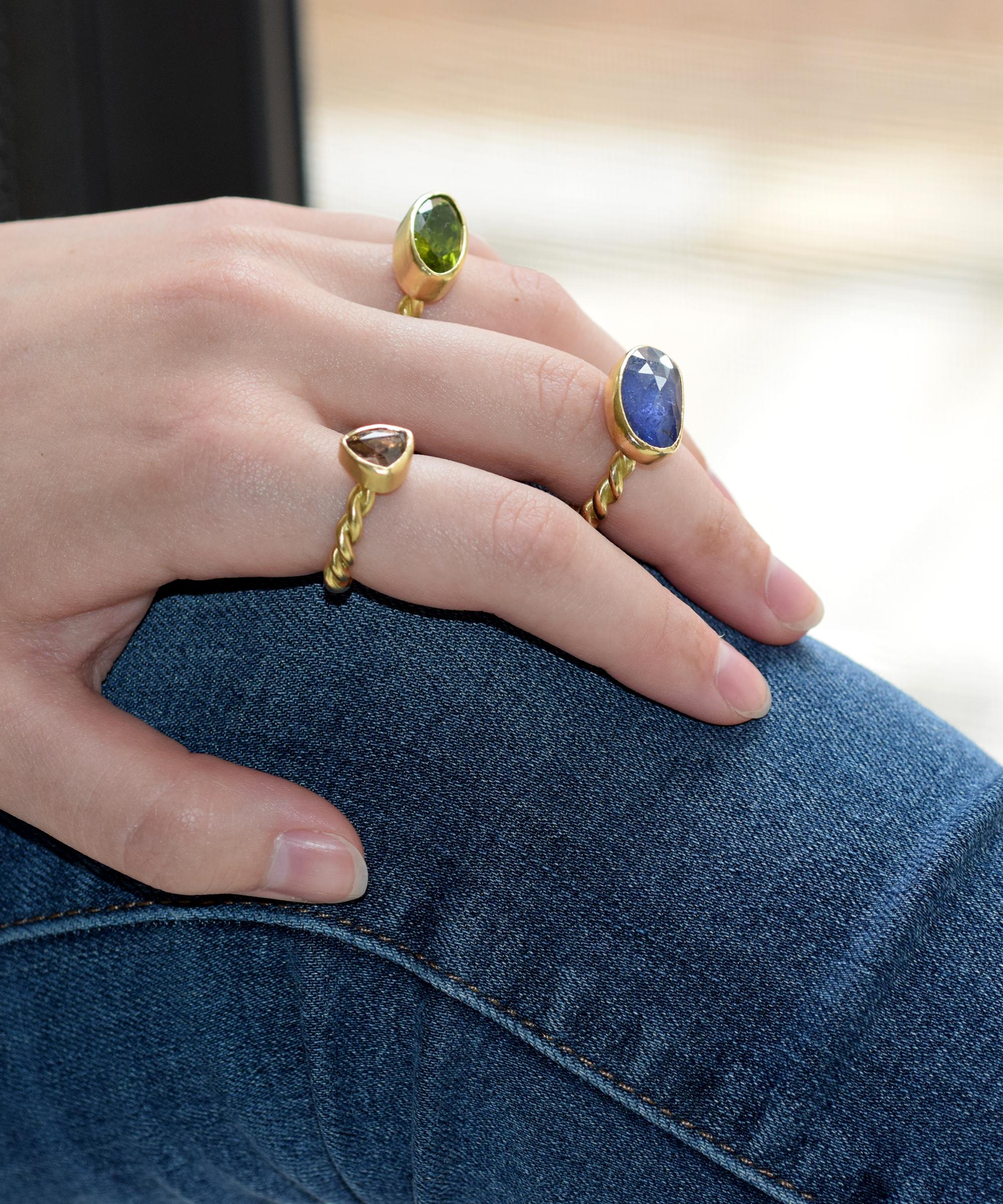 Contemporary Peridot Gold Rope Ring For Sale