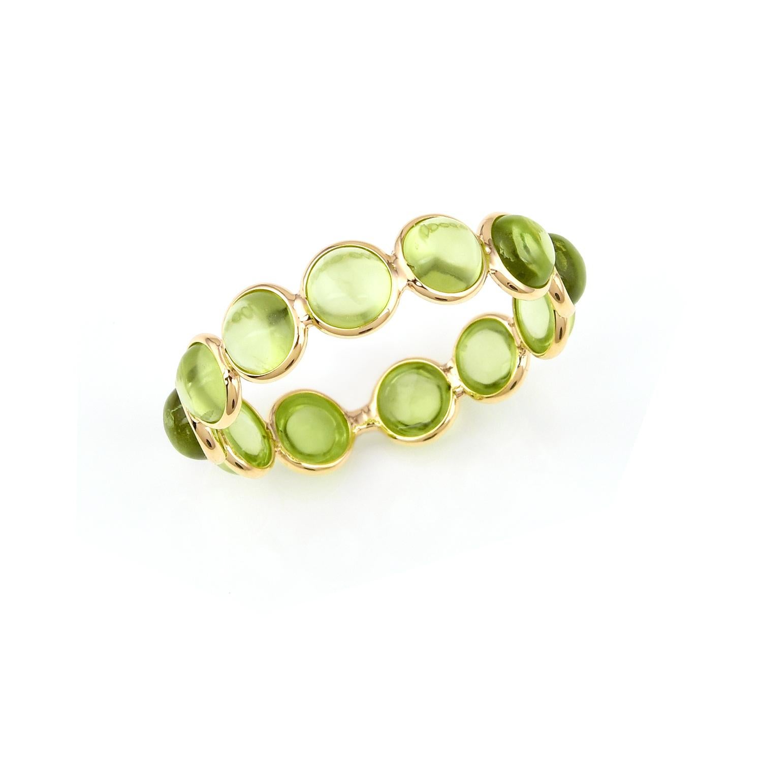 Shape: Round Cabochon

Stone: Peridot

Metal: 14 Karat Yellow Gold (can be customized)

Style: Single Line Band

Ring Size: US 6.50 (can be customized)

Stone Weight: appx. 4.70 carats of Peridot

Total Weight: 1.50 grams