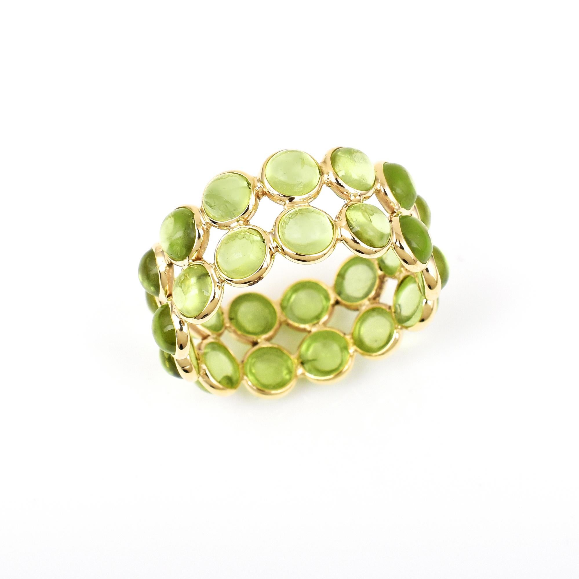 Form: Runder Cabochon

Stein: Peridot

Metall: 14 Karat Gelbgold (kann angepasst werden)

Stil: Double Line Band

Ring Größe: US 7.50 (kann angepasst werden)

Steingewicht: ca. 10 Karat Peridot

Gesamtgewicht: 3,30 Gramm