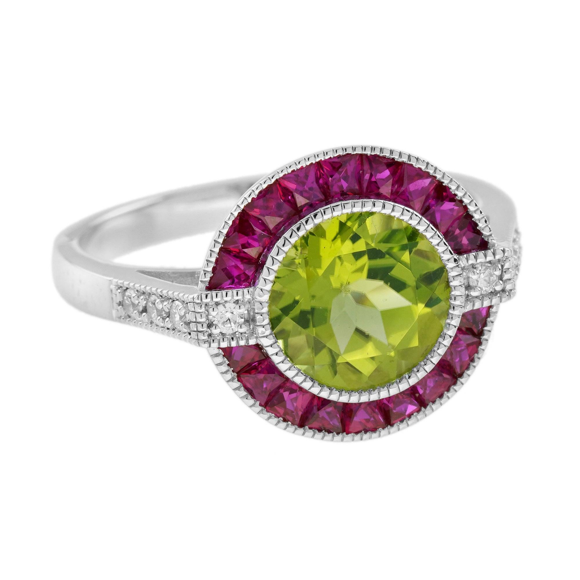 A striking and intriguing jewel, indeed. This bold and colorful Art Deco style ring highlights a gorgeous gleaming round cut peridot framed in eye-catching contrast by French cut rubies. Each side and shoulders set off with round diamond with