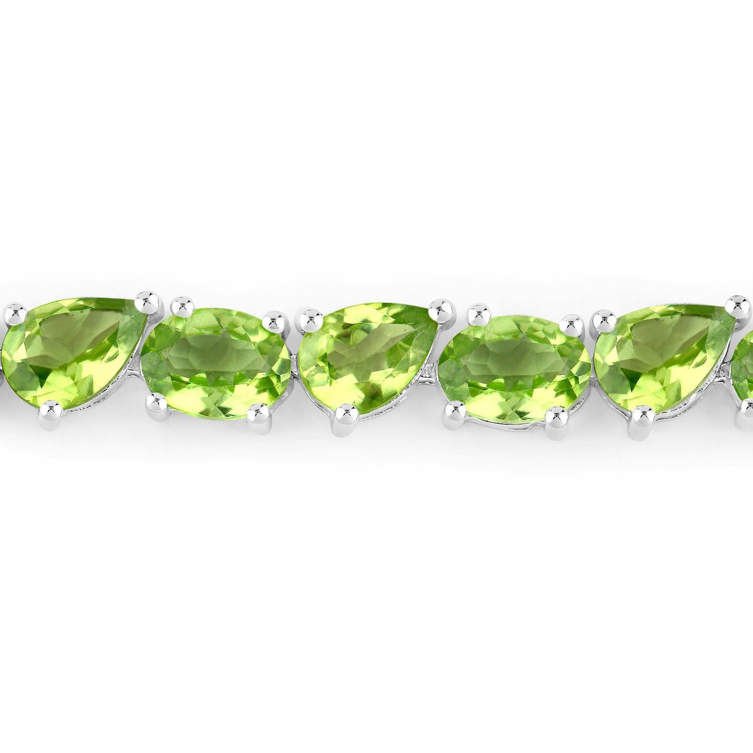 Taille mixte Bracelet tennis en argent sterling avec péridot 21.30 carats en vente