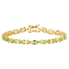 Peridot Tennis Bracelet 8.6 Carats Oval Cut 14K Yellow Gold Plated Silver
