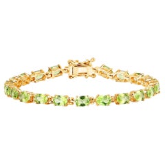Peridot Tennis Bracelet 8.6 Carats Oval Cut 14K Yellow Gold Plated Silver