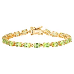 Peridot Tennis Bracelet 8.6 Carats Oval Cut 14K Yellow Gold Plated Silver