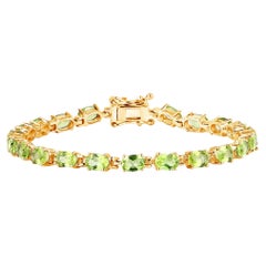 Peridot Tennis Bracelet 8.6 Carats Oval Cut 14K Yellow Gold Plated Silver