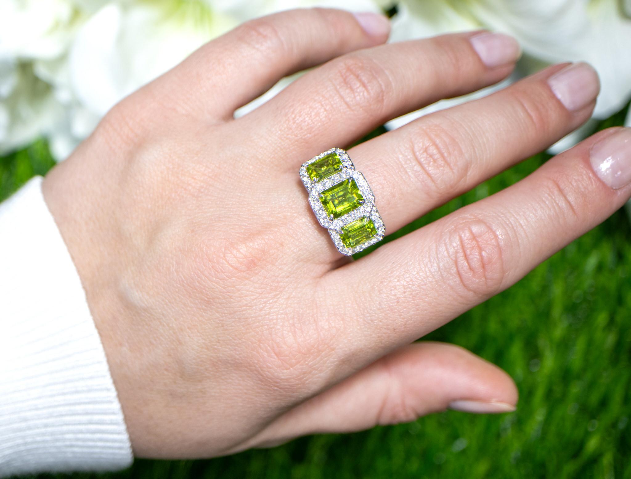 It comes with the Gemological Appraisal by GIA GG/AJP
All Gemstones are Natural
Peridots = 4.36 Carats
Diamonds = 0.78 Carats
Metal: 18K White Gold
Ring Size: 6.5* US
*It can be resized complimentary