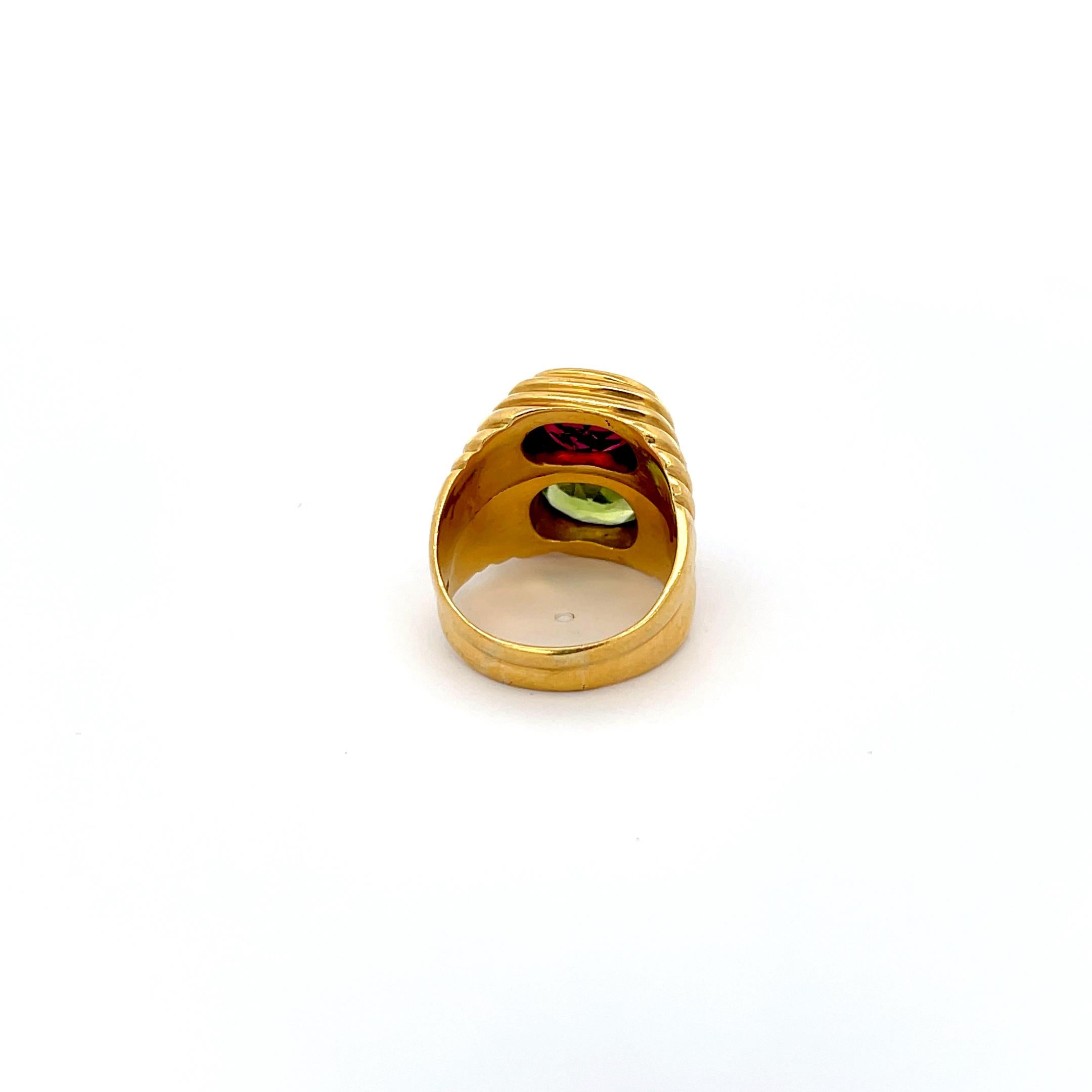 Peridot & Tourmaline Ring 18K Yellow Gold. Size 7.75
19.38 Grams