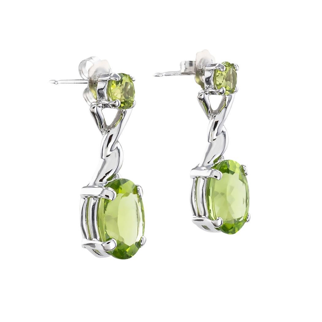 Estate peridot and white gold drop earrings.

Clear and concise information you want to know is listed below. 

Contact us right away if you have additional questions. 

We are here to connect you with beautiful and affordable estate and vintage