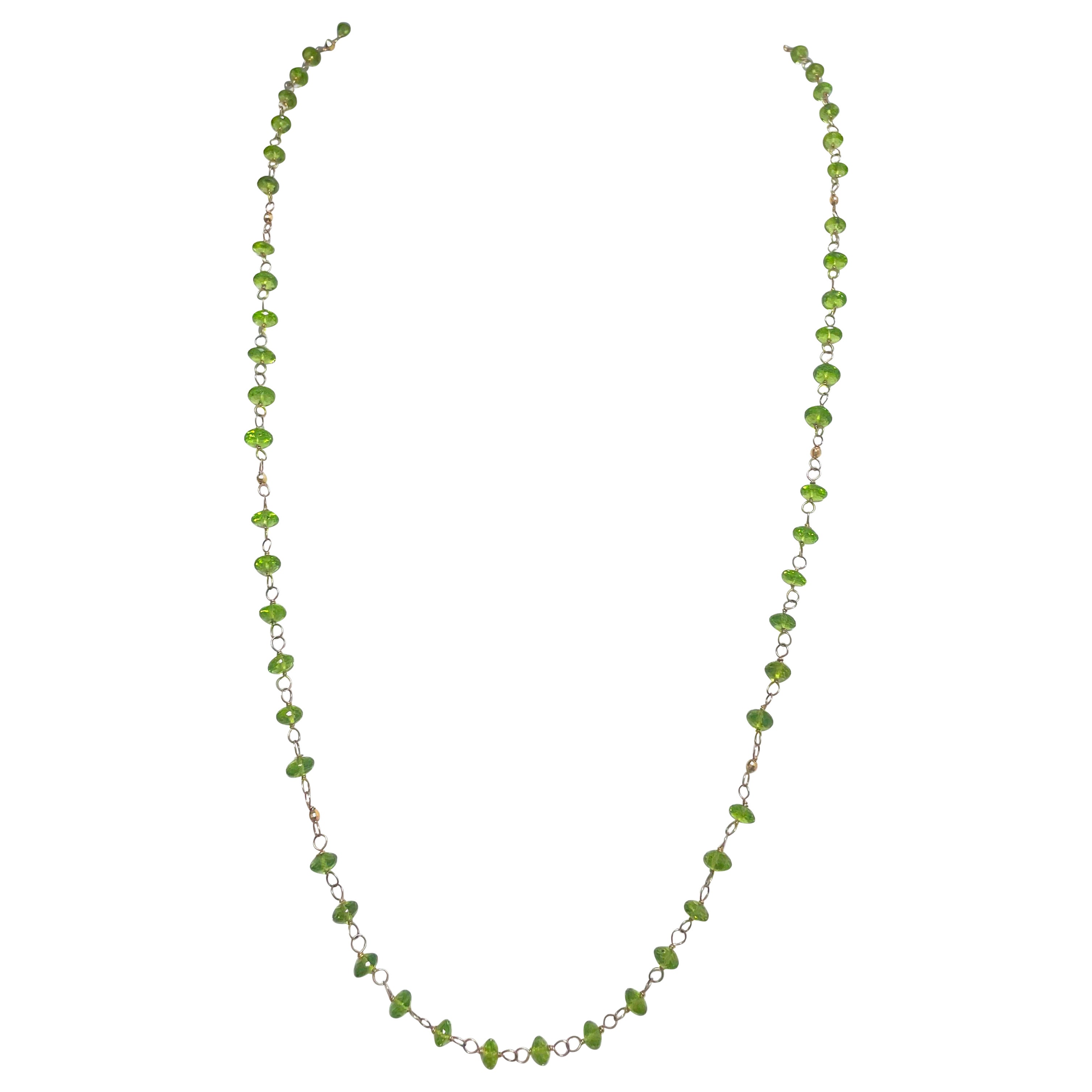 Peridot mit 14 Karat Golddraht umwickelter Paradizia-Halskette
