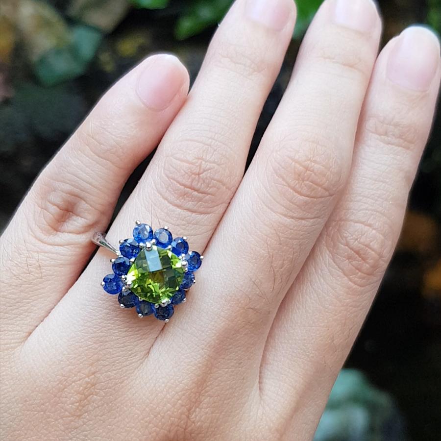 A fun Summer ring: Color blocking of Peridot 3.13 carats with Blue Sapphire 2.37 carats Ring set in 18 Karat White Gold Settings 

Width: 1.5 cm
Length: 1.5 cm 
Ring Size:  51
Weight: 5.24 grams

