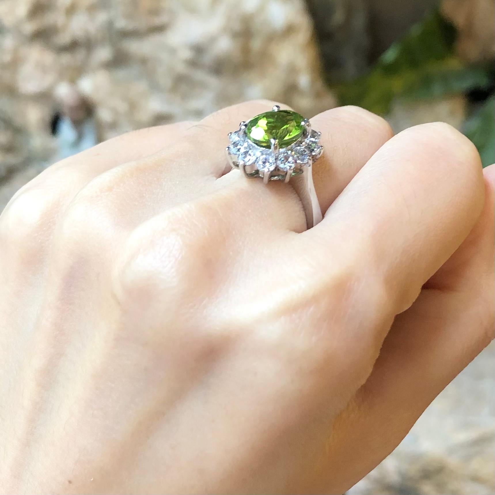 Women's Peridot with Cubic Zirconia Ring set in Silver Settings For Sale