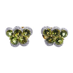 Boucles d'oreilles en or 18 carats serties de péridots et de diamants