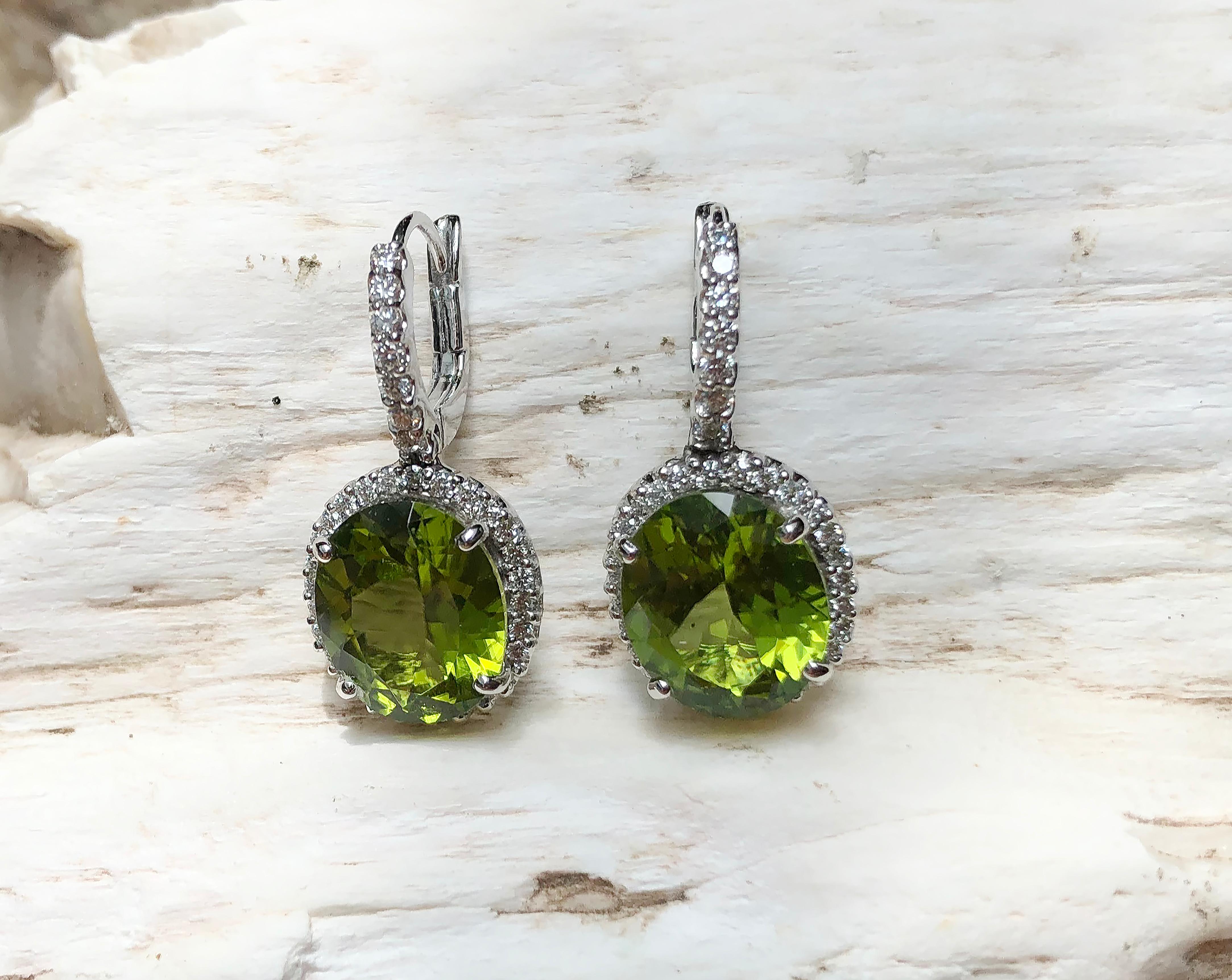 Oval Cut Peridot with Diamond Earrings Set in 18 Karat White Gold Settings