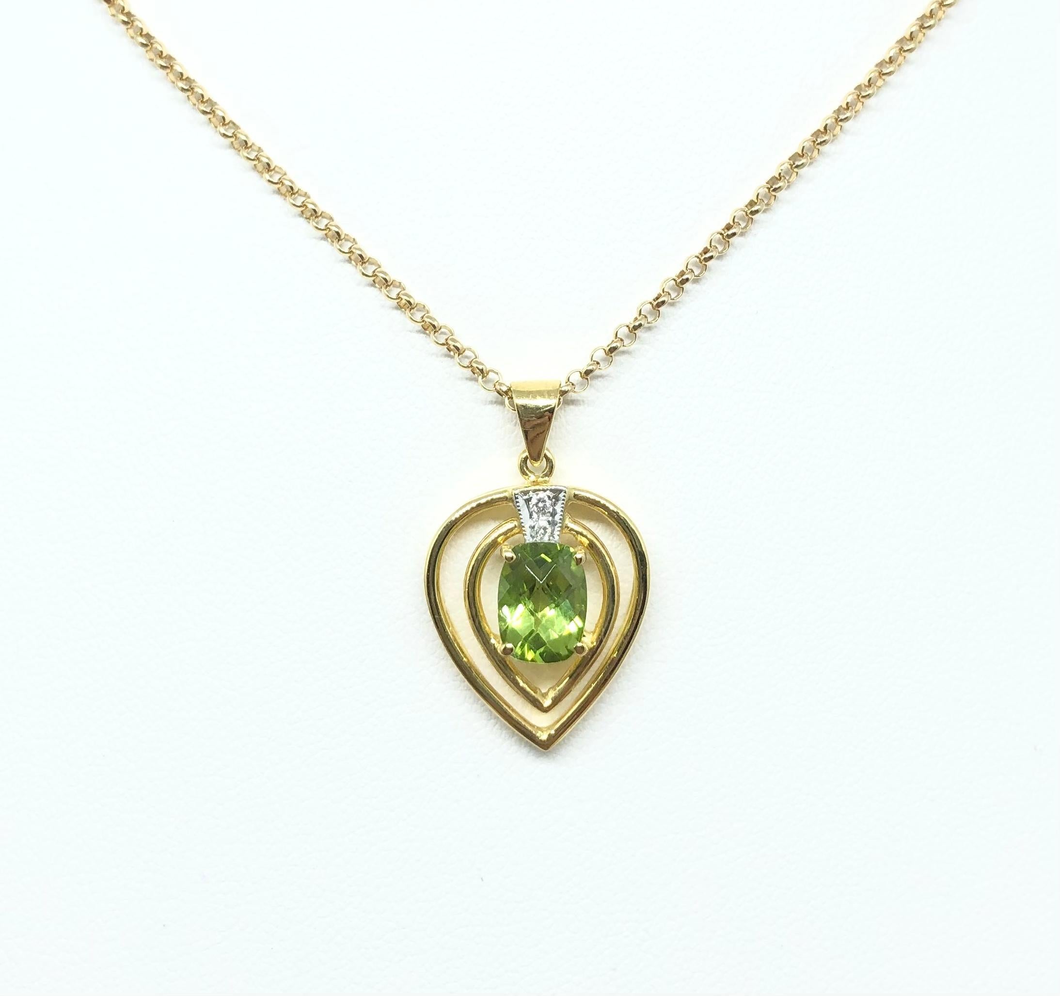 Peridot 1.50 carats with Diamond 0.02 carat Pendant set in 18 Karat Gold Settings
(chain not included)

Width: 1.6 cm 
Length: 2.5 cm
Total Weight: 2.63  grams

