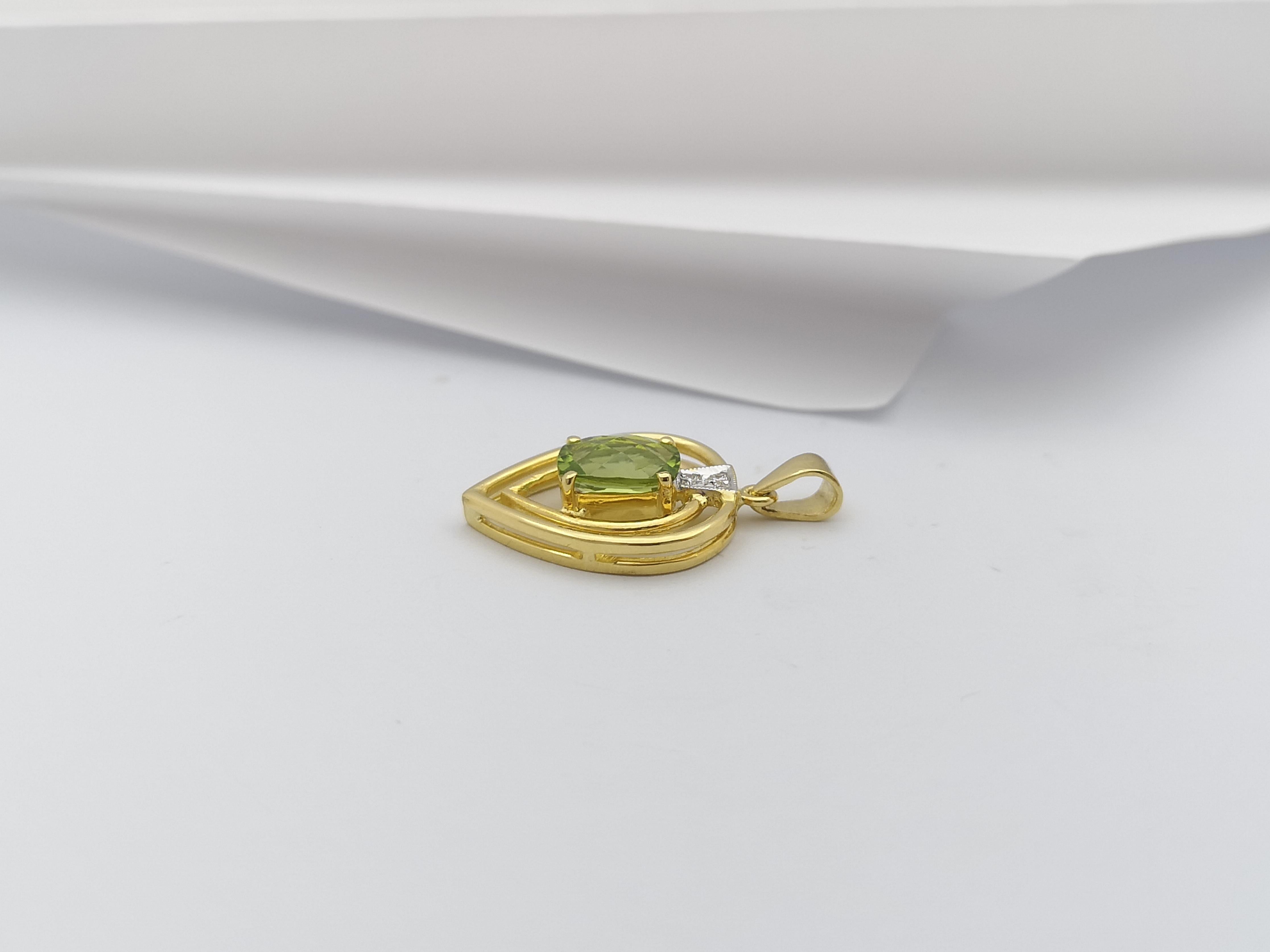 Women's Peridot with Diamond Pendant Set in 18 Karat Gold Setting For Sale
