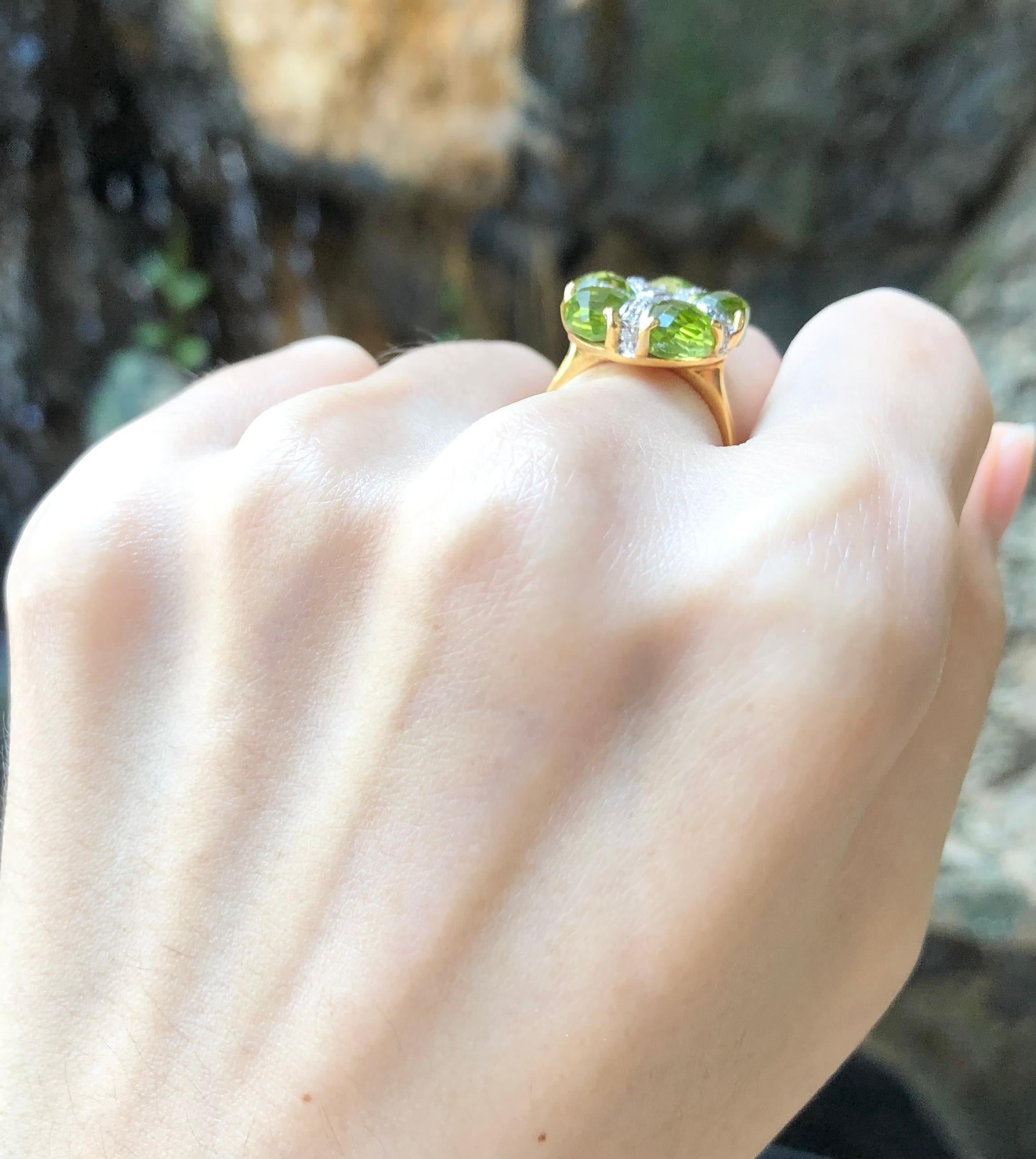 Mixed Cut Peridot with Diamond Ring Set in 14 Karat Gold Settings For Sale