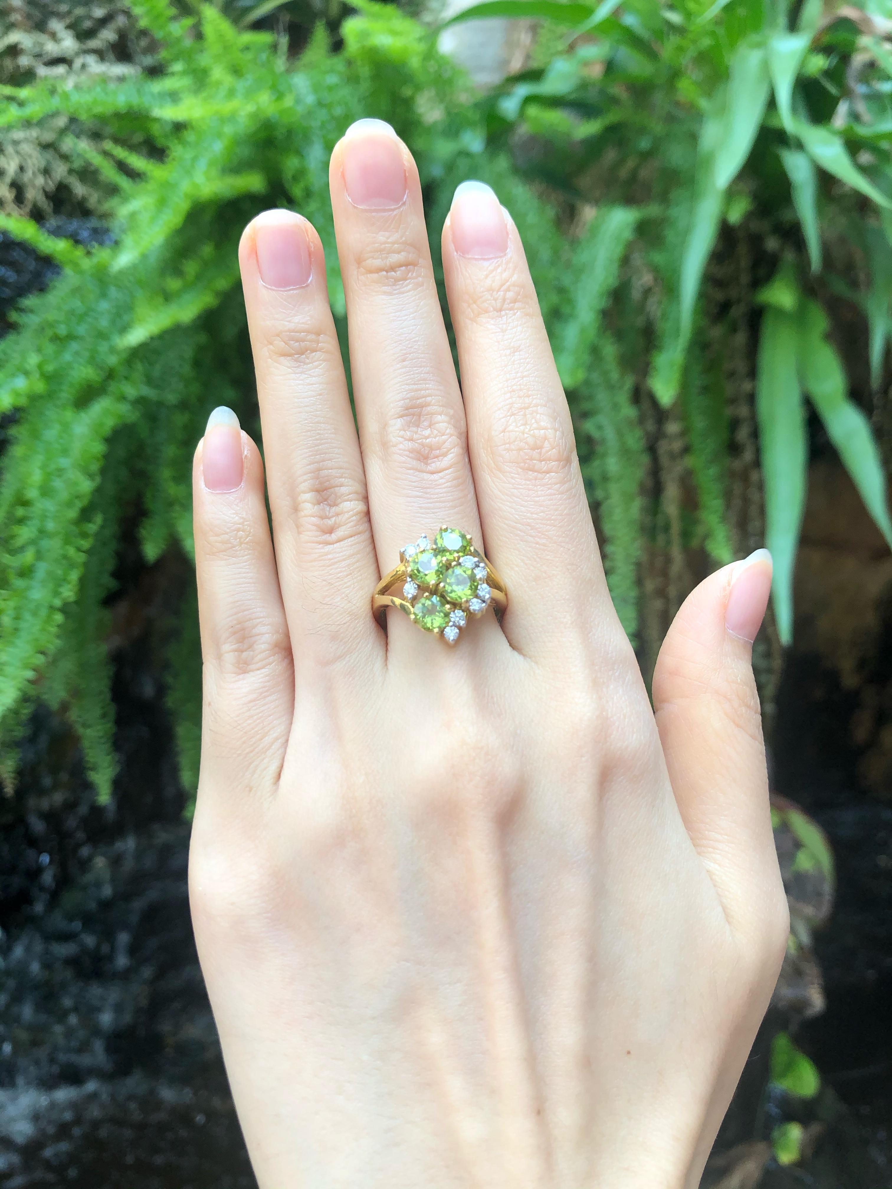 Peridot 2.47 carats with Diamond 0.28 carat Ring set in 18 Karat Gold Settings

Width: 1.1 cm
Length: 1.8 cm 
Ring Size: 56

