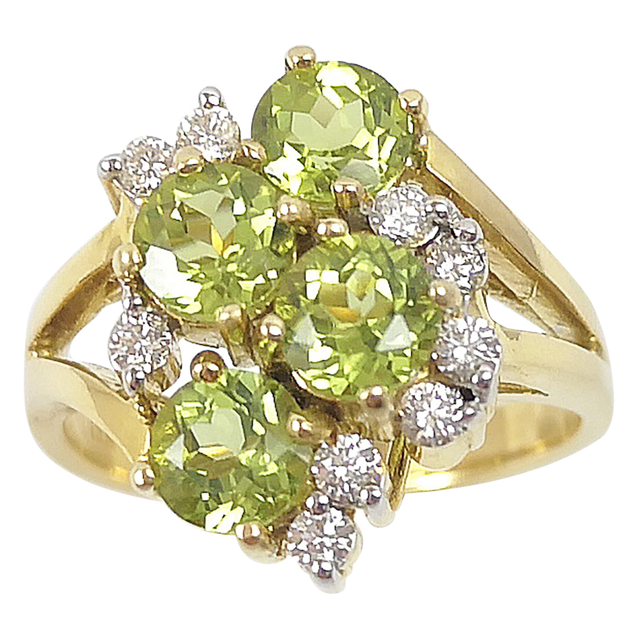 Peridot with Diamond Ring Set in 18 Karat Gold Settings