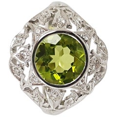 Peridot with Diamond Ring Set in 18 Karat White Gold Settings