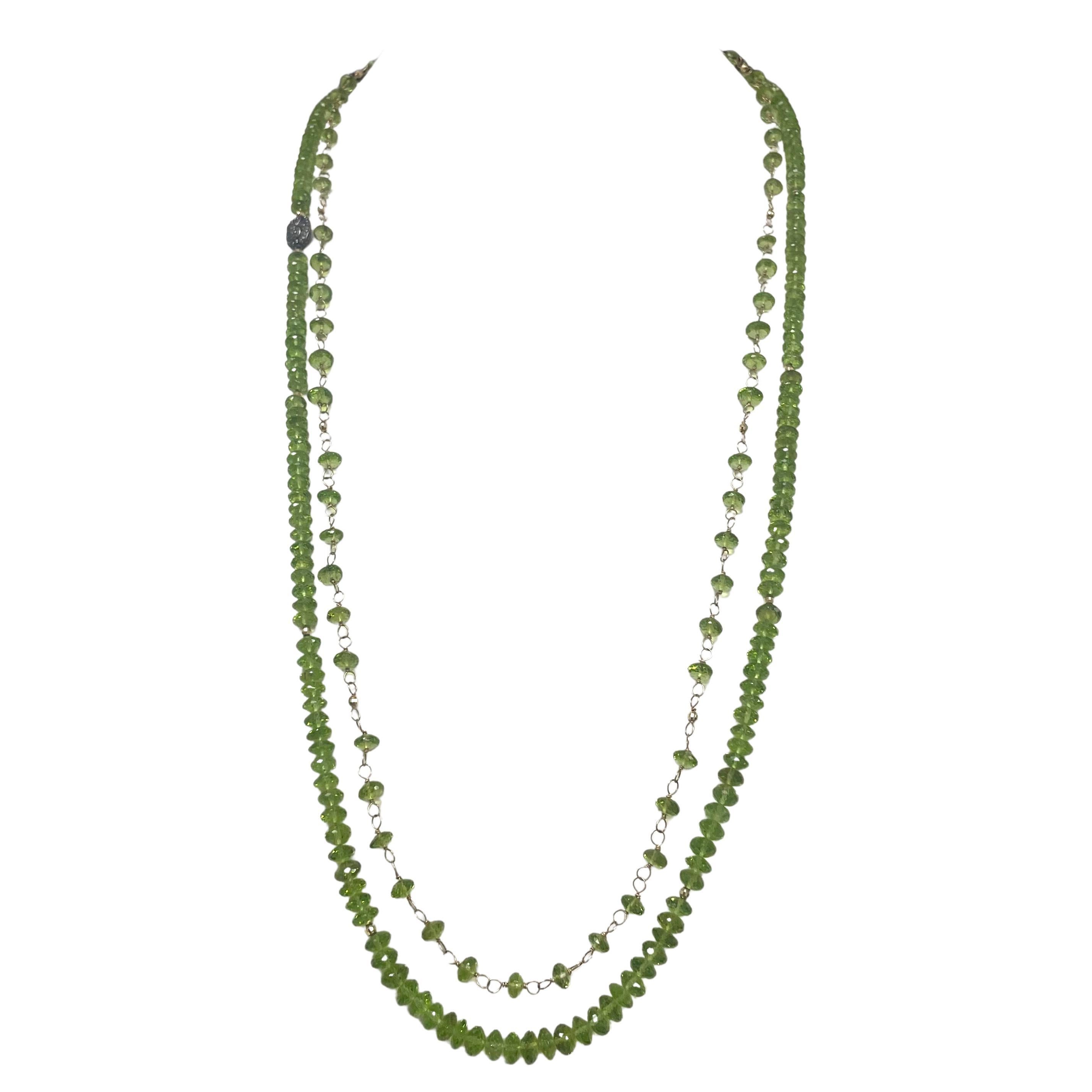 Description
This necklace doesn’t go unnoticed with its exquisite and vibrant, high luster AAA quality Peridot. A beautiful pave diamond accent piece sits elegantly on one side, creating an asymmetrical harmony. Precious, tiny 14k gold balls are