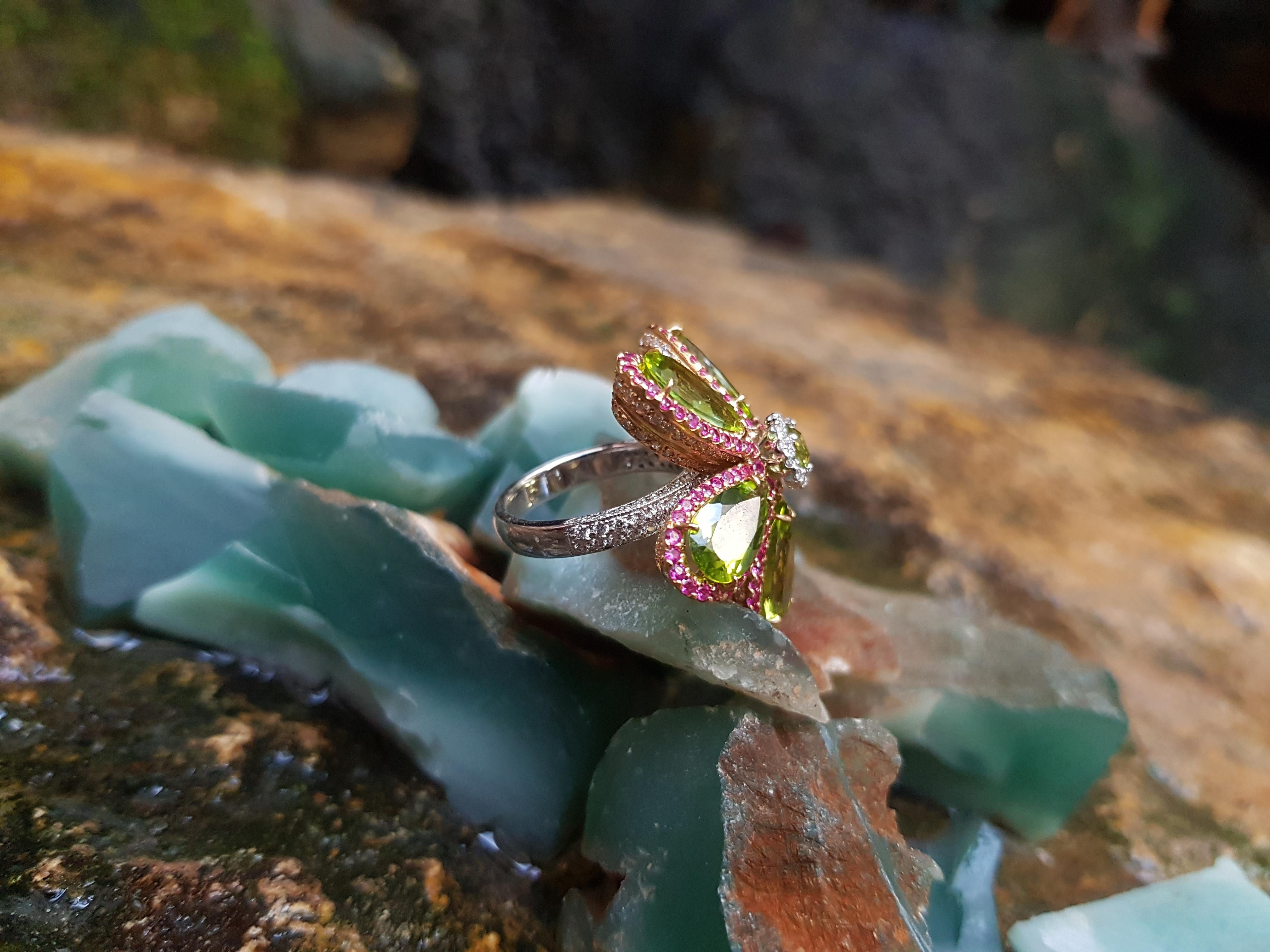 Women's Peridot with Pink Sapphire and Diamond Flower Rings Set in 18 Karat White Gold For Sale