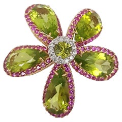 Anillos Flor de Peridoto con Zafiro Rosa y Diamante engastados en Oro Blanco de 18 Kilates