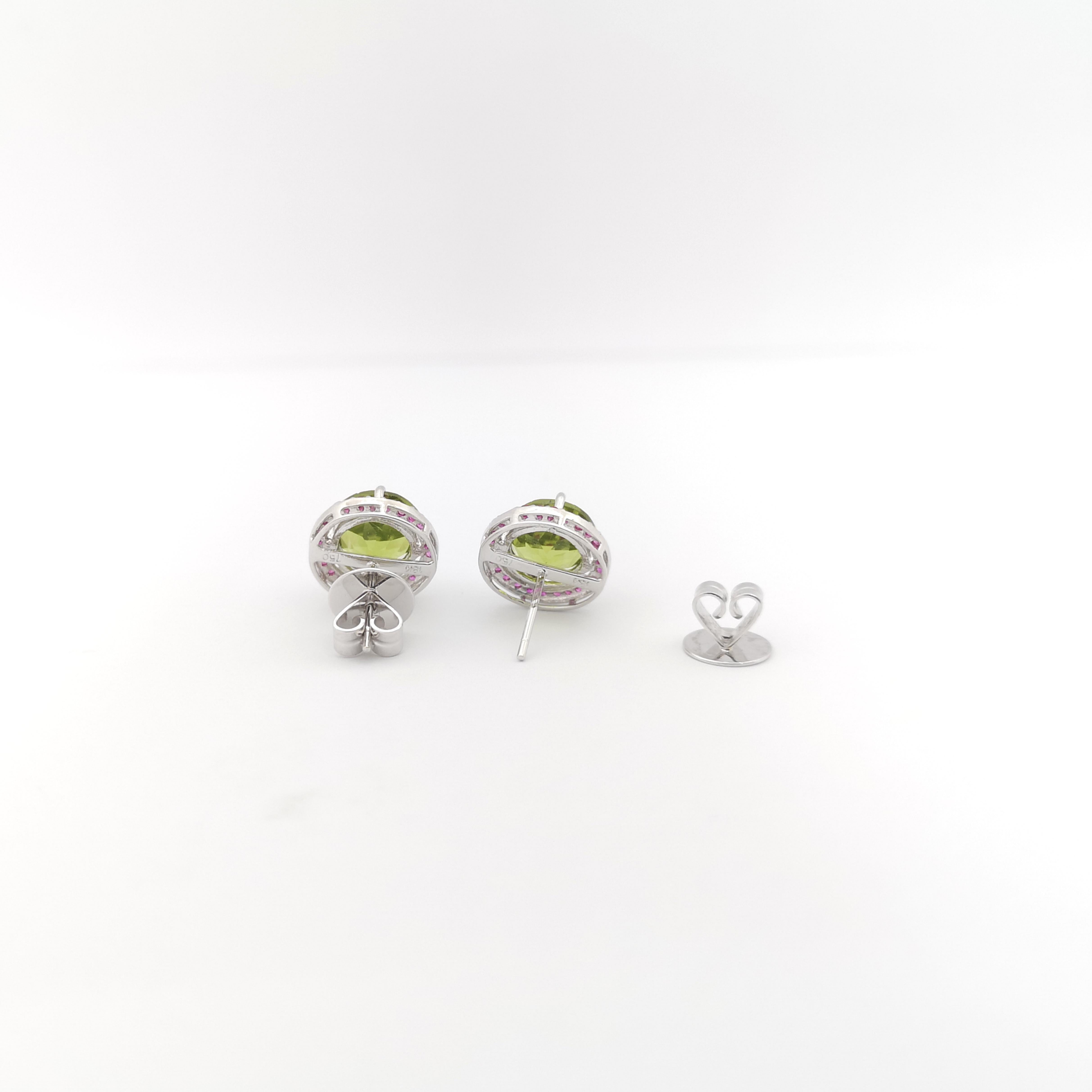 Peridot with Pink Sapphire Earrings set in 18K White Gold Settings For Sale 1