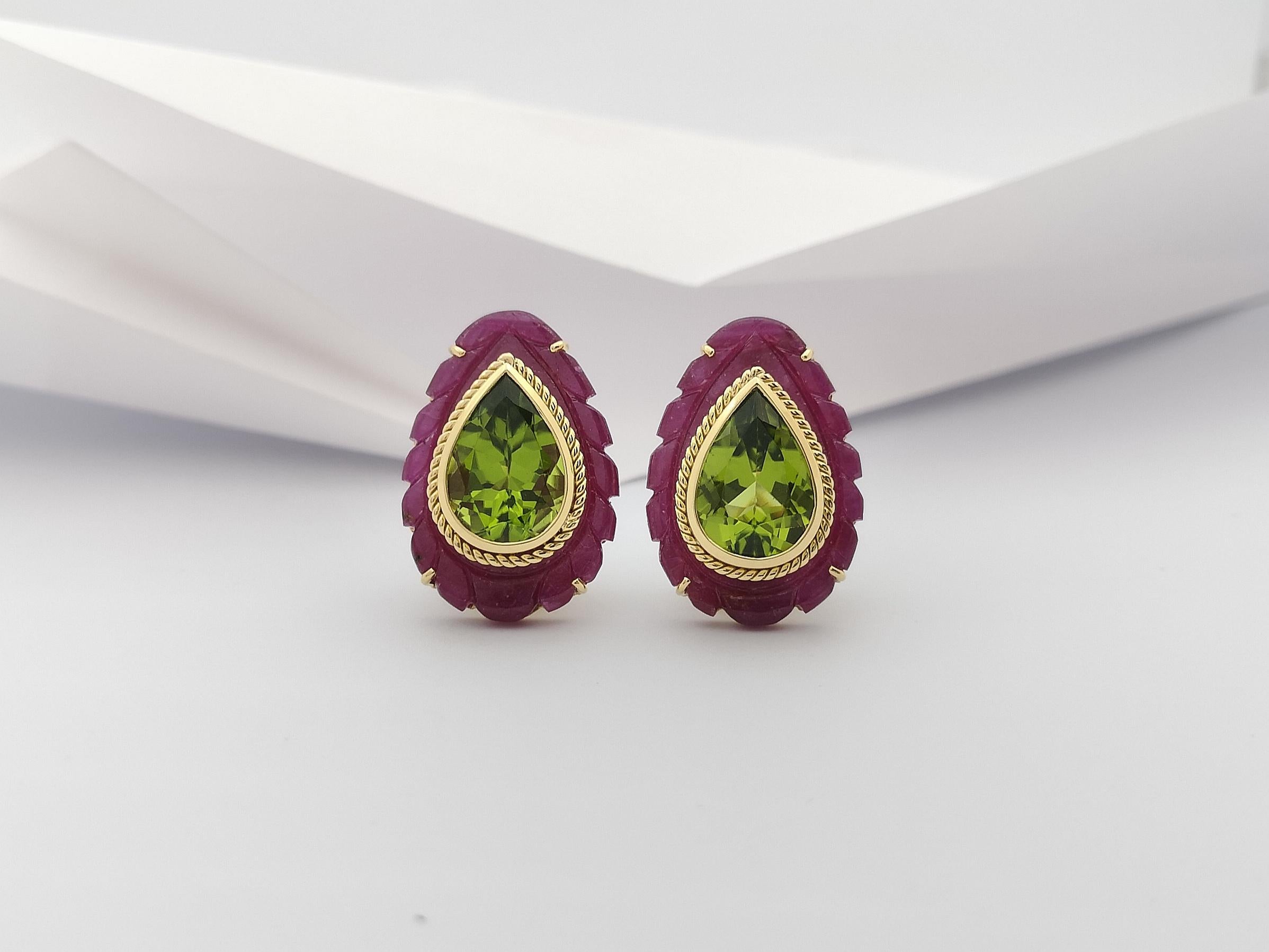 Contemporary Peridot with Ruby Earrings Set in 18 Karat Gold Settings For Sale