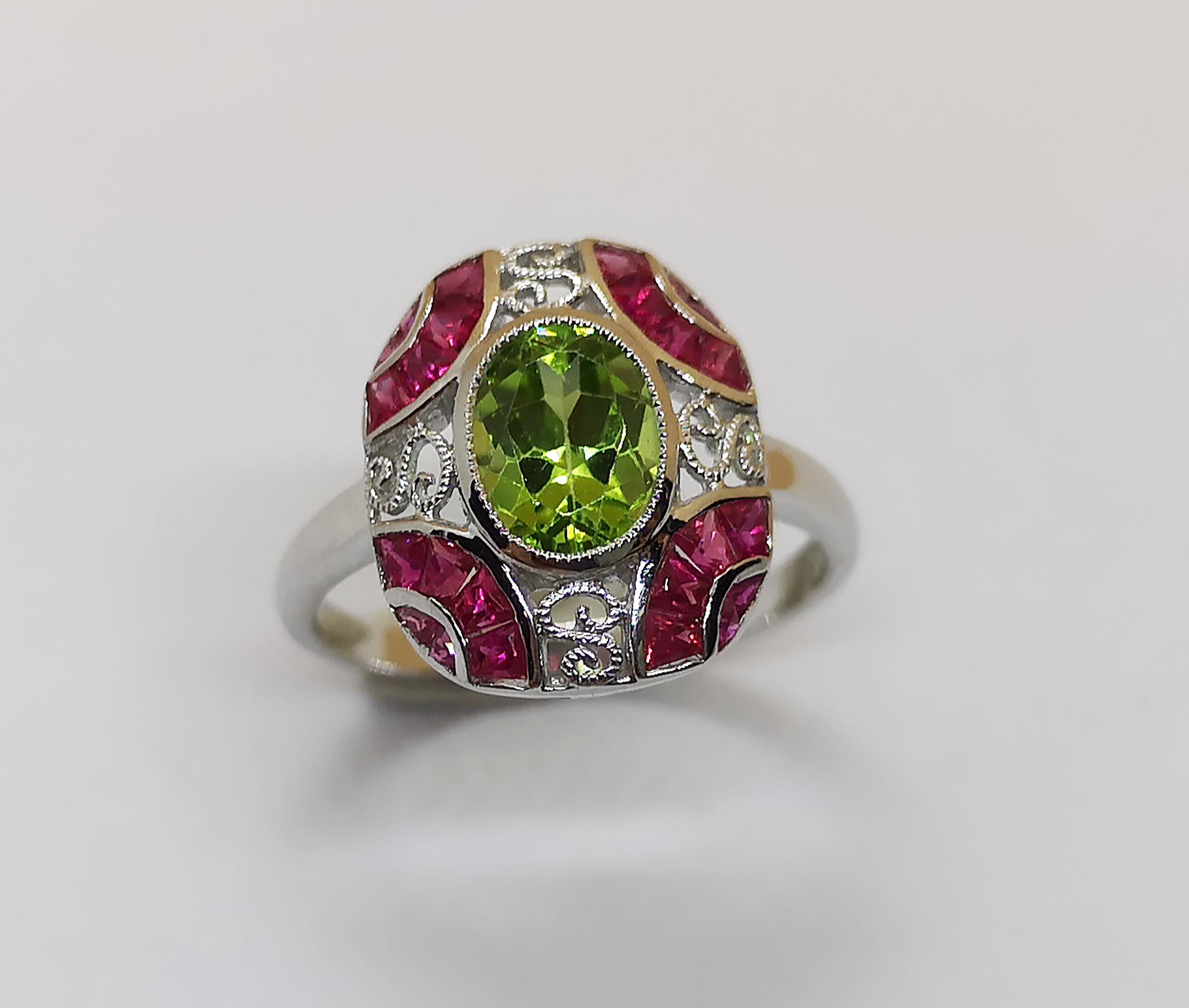 Peridot 1.57 carats with Ruby 1.80 carats Ring set in 18 Karat White Gold Settings 

Width: 1.0 cm
Length: 1.6 cm 
Ring Size: 57

