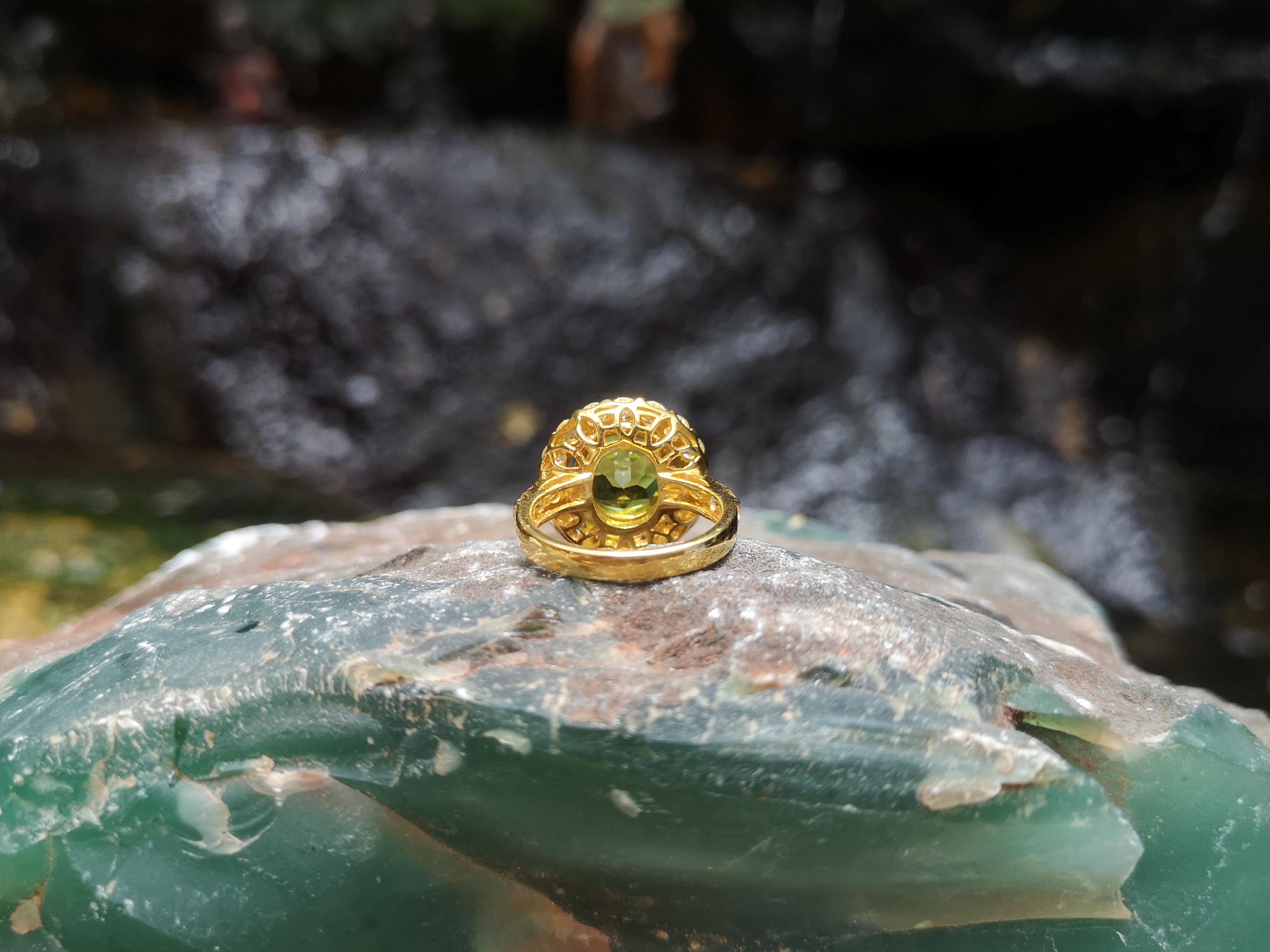 Women's Peridot with Yellow Diamond Ring Set in 18 Karat Gold Settings For Sale