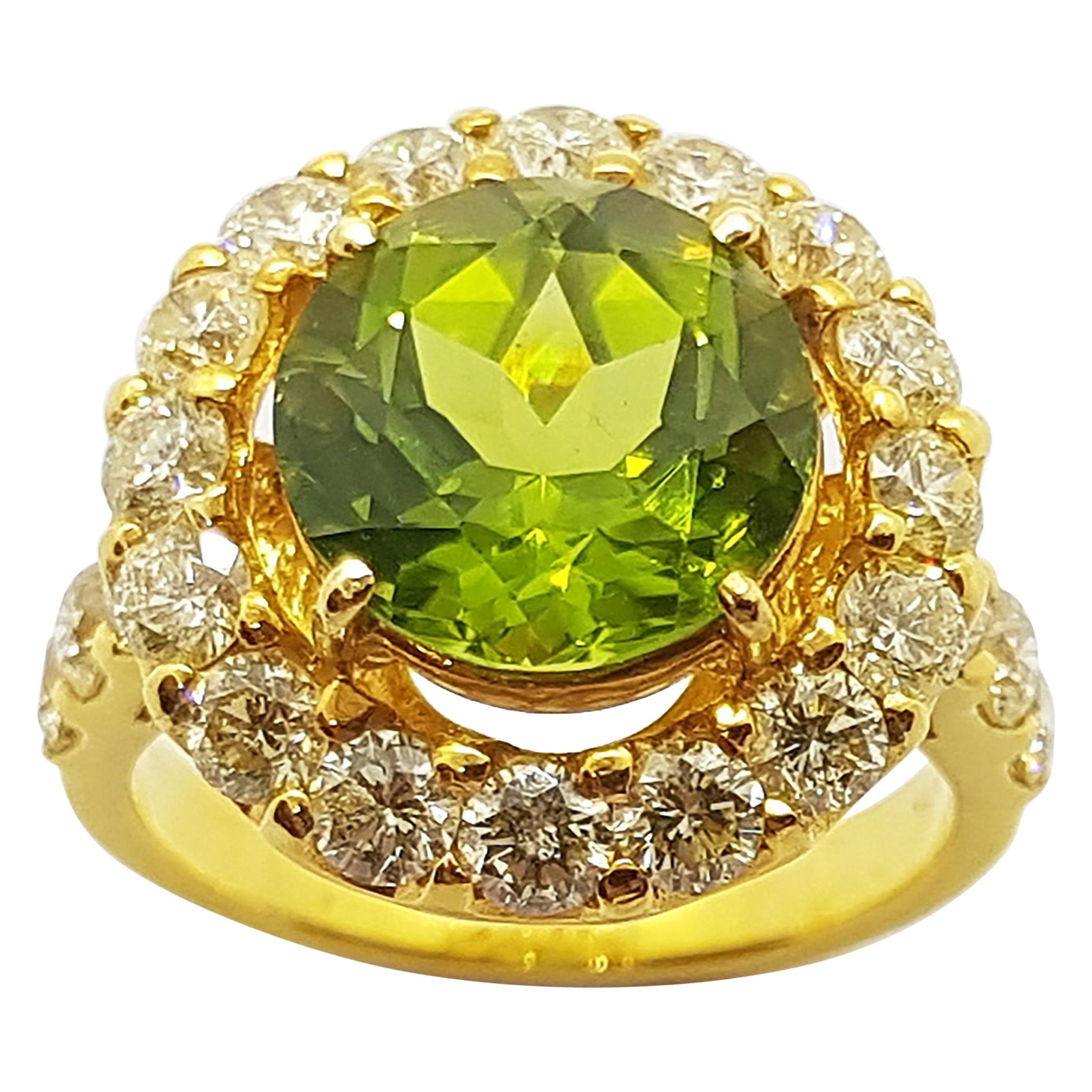 Peridot with Yellow Diamond Ring Set in 18 Karat Gold Settings For Sale