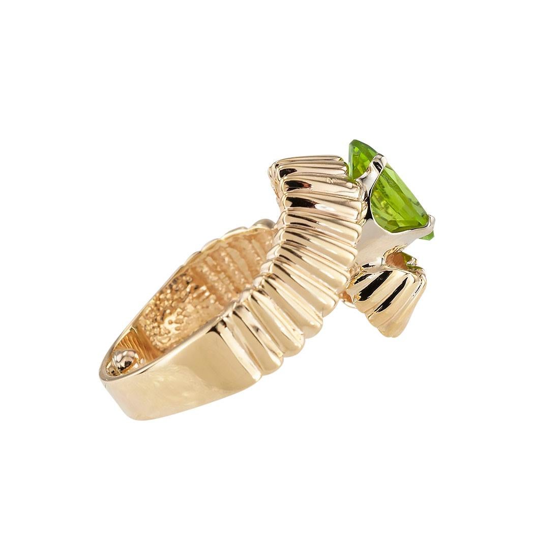 Peridot and yellow gold solitaire ring circa 1980.  Clear and concise information you want to know is listed below.  Contact us right away if you have additional questions.  We are here to connect you with beautiful and affordable