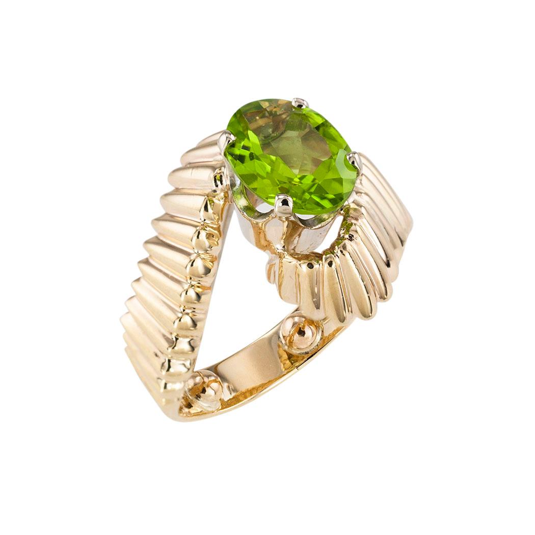 Contemporary Peridot Yellow Gold Solitaire Ring For Sale