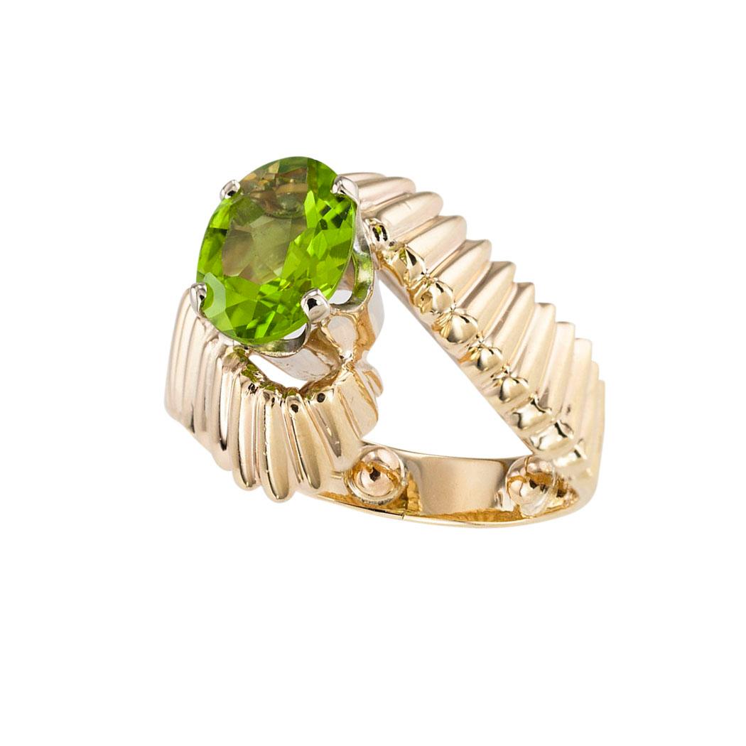 Oval Cut Peridot Yellow Gold Solitaire Ring For Sale