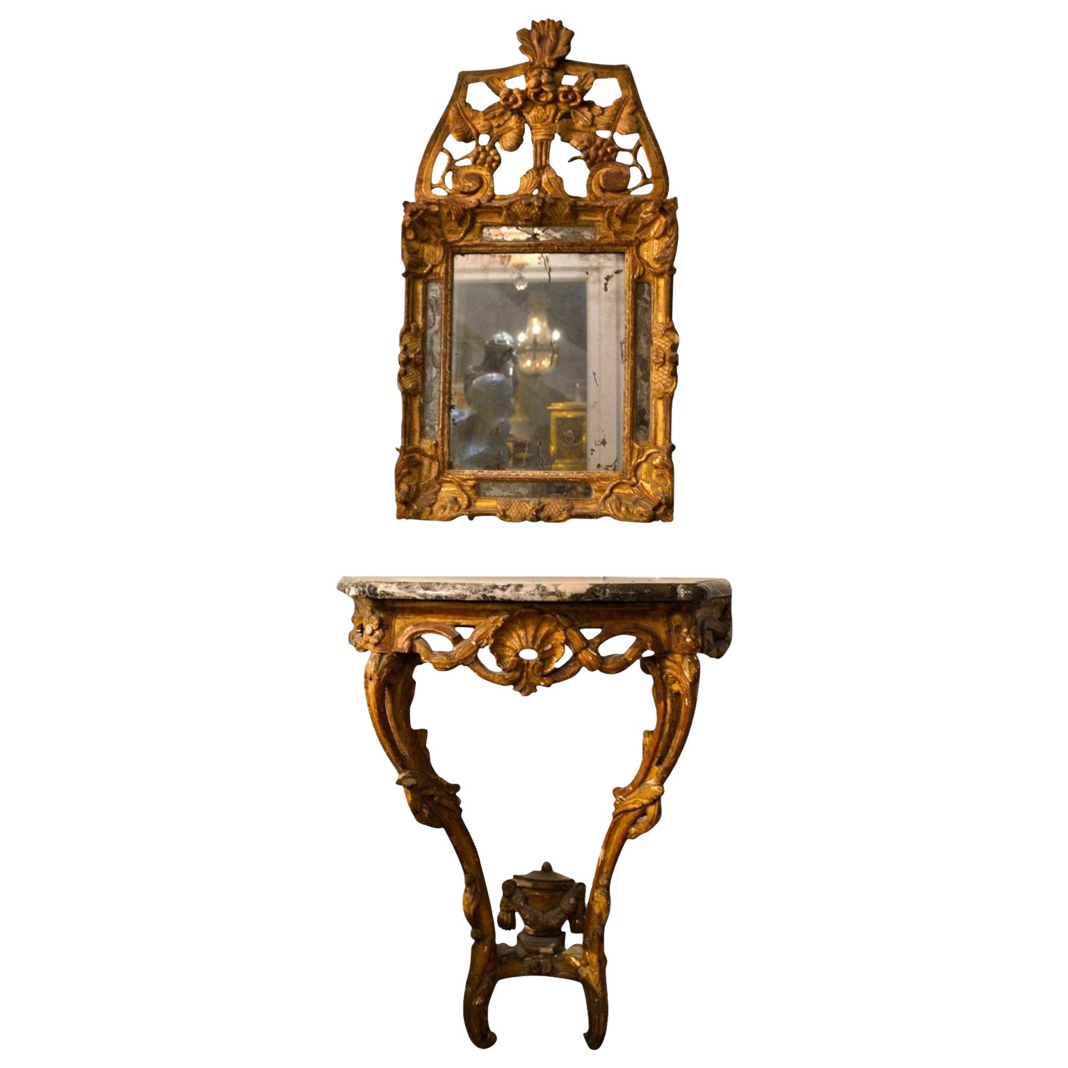 Console et miroir d'époque Louis XV du 18ème siècle en bois doré sculpté en vente