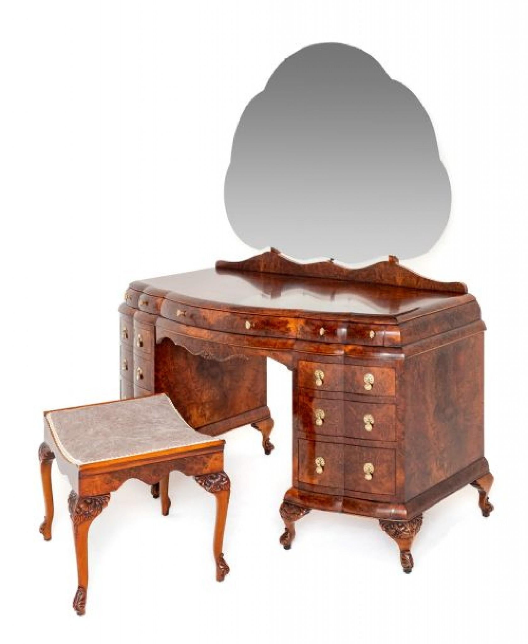 Fantastic Art Deco Burr Walnut Bedroom Suite.
This Superb Suite Comprises of a Triple Wardrobe, Double Wardrobe, Dressing Table, Stool, Bedside Cabinet and Double Bed.
The Suite is Constructed from The Finest Burr Walnut Veneers.
Having Solid