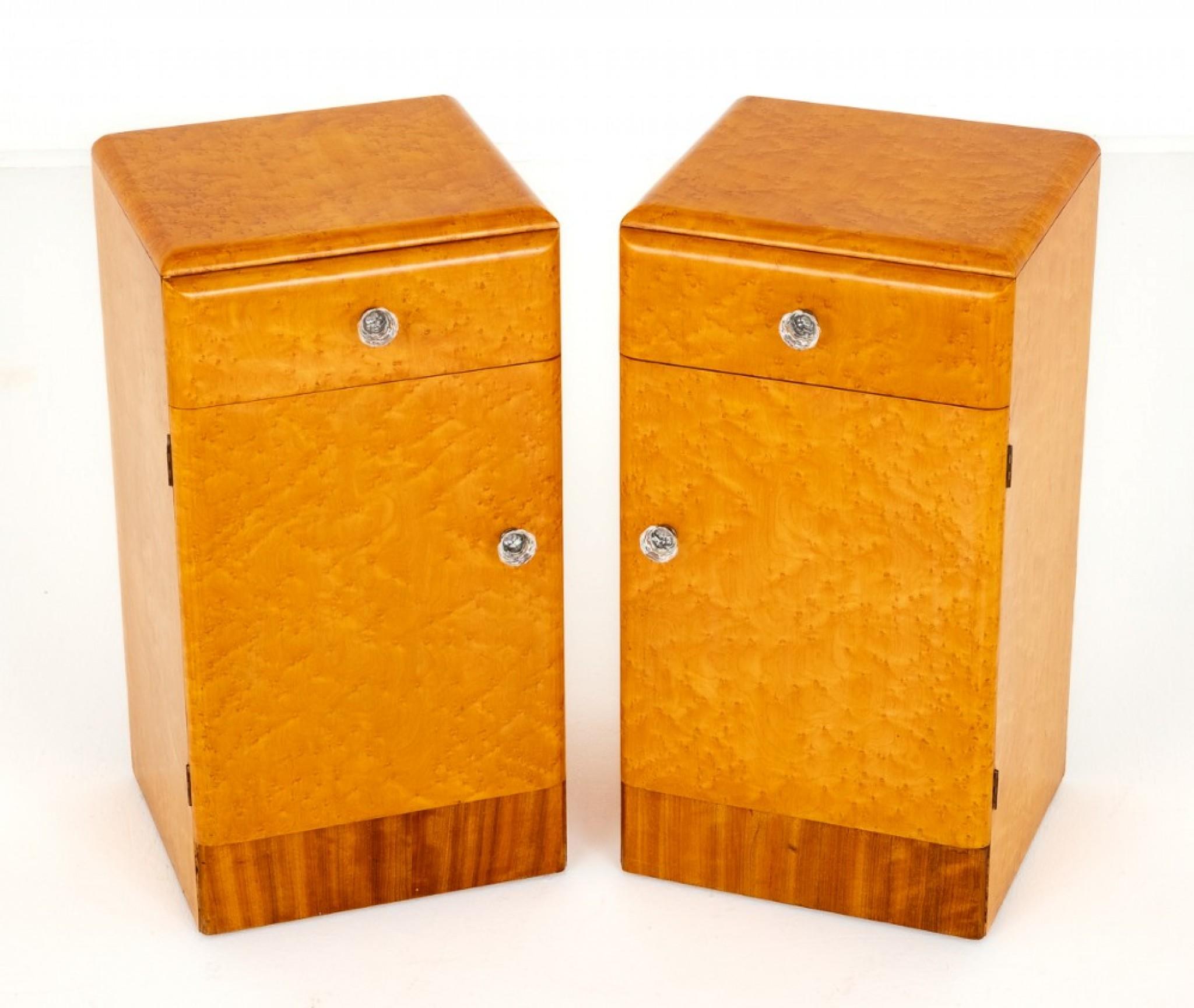 Pair of Art Deco Birds Eye Maple Bedside Cabinets.
These Stylish Cabinets Feature Wonderful Birds Eye Maple Veneers to the Fronts, Tops and Sides.
Each Cabinet Has 1 Interior Shelf and a Mahogany Lined Drawer.
The Cabinets are Finished off with