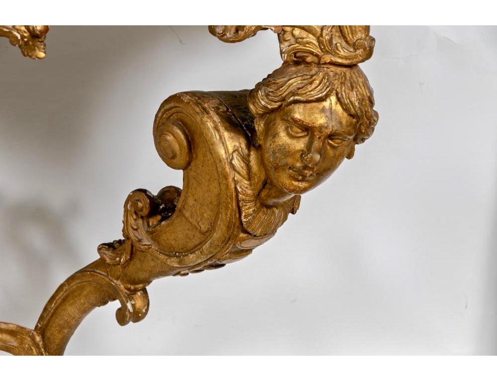 Period French Regence giltwood marble top console table, early 18th century with human head supports and hoof feet.

Original gilding in good condition.